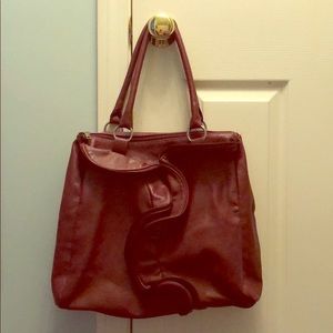 JustFab burgundy purse with zipper ruffle detail
